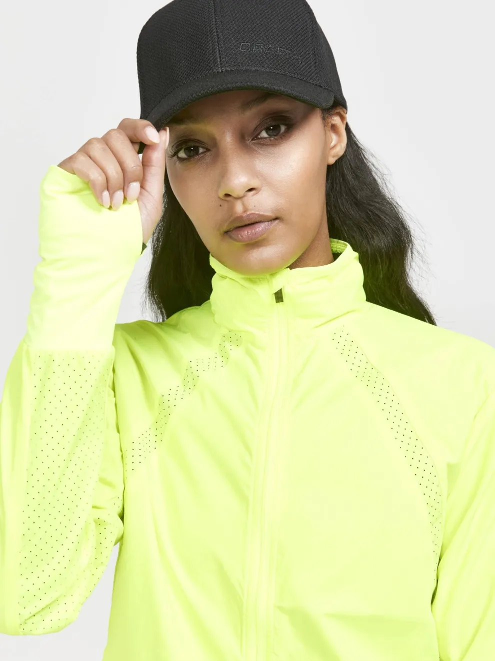 WOMEN'S ADV ESSENCE WIND JACKET - GLOW