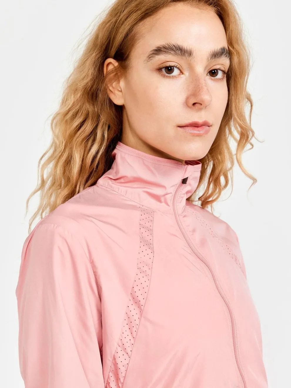 WOMEN'S ADV ESSENCE WIND JACKET - GLOW